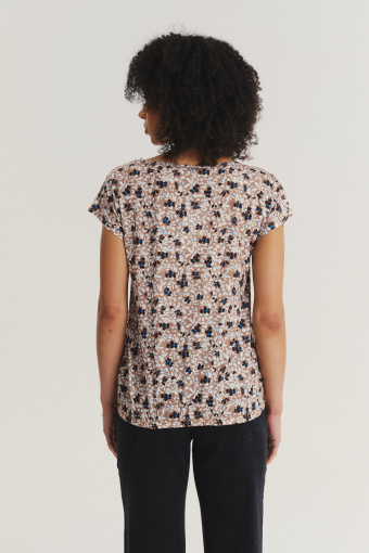 Beżowy top w kwiaty z krótkim rękawem