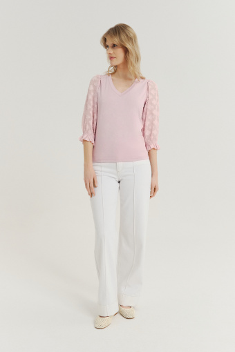 Jasnoróżowy top z efektownymi rękawami