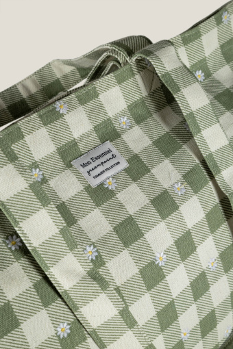 Kremowo-zielona torba z nadrukiem w stokrotki