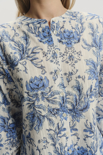 Elegancka bluzka w kwiaty z podkreśloną talią Elegancka bluzka w kwiaty z podkreśloną talią