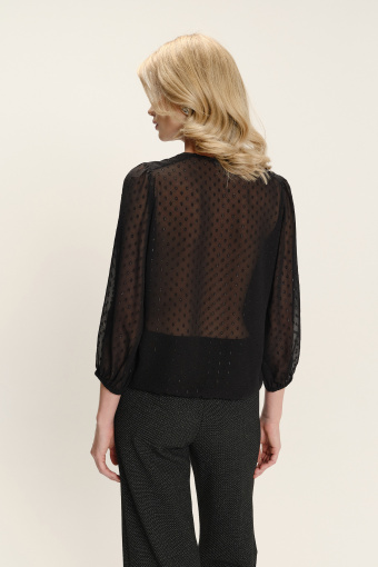Elegancka czarna bluzka z delikatnym printem i półtransparentnymi rękawami