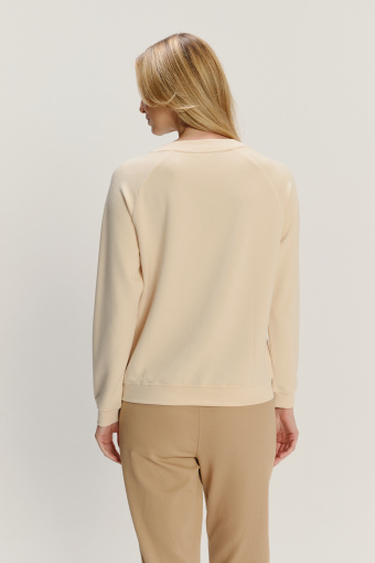 Kremowa bluza z przeszyciem z przodu