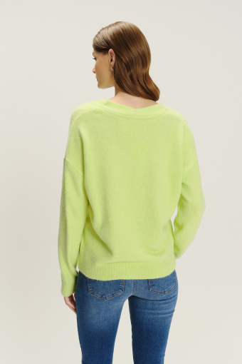 Luźny sweter w kolorze jasnej zieleni dekolt w V
