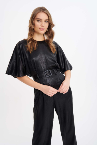 Połyskujący kombinezon z wycięciem na plecach