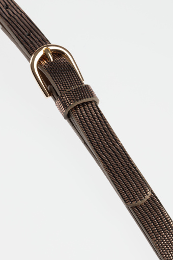 Miedziany pasek z tłoczeniem