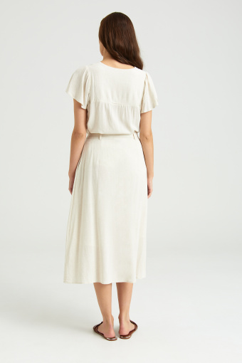 Beżowa spódnica z kontrastowymi guzikami