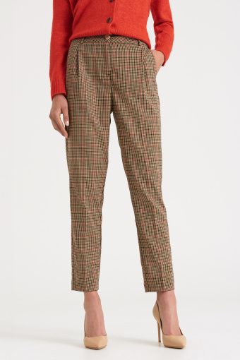 Beżowe spodnie cygaretki, nadruk w kratę