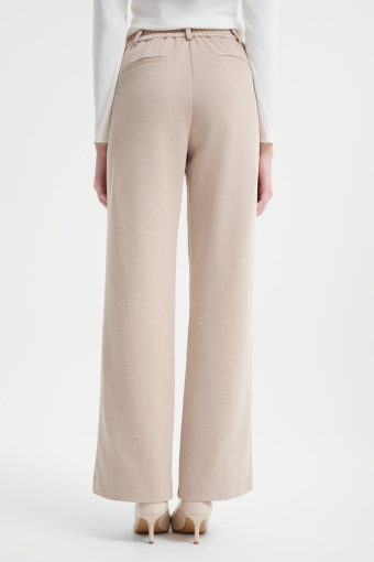 Beżowe spodnie z szeroką nogawką 