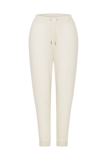Luźne, dresowe spodnie w kremowym kolorze Luźne, dresowe spodnie w kremowym kolorze
