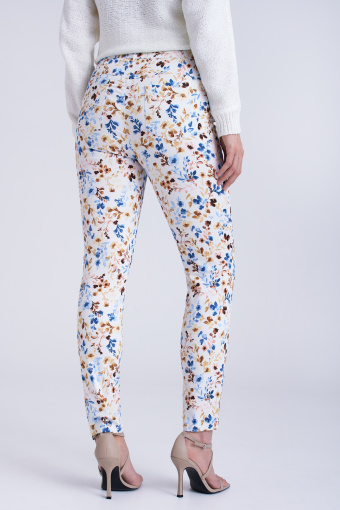 Dopasowane spodnie w kolorowe kwiaty