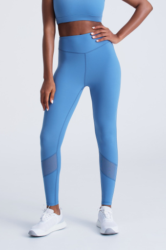 Niebieskie legginsy ozdobione siateczką