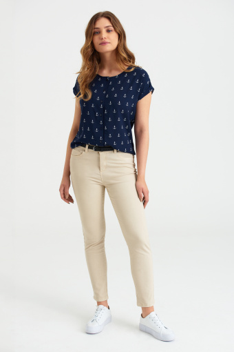 Bawełniane spodnie typu slim, kremowe