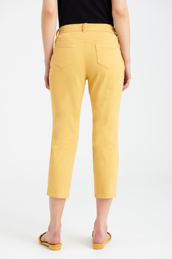 Żółte, bawełniane spodnie o długości 7/8