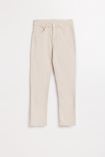 Dopasowane beżowe jeansy