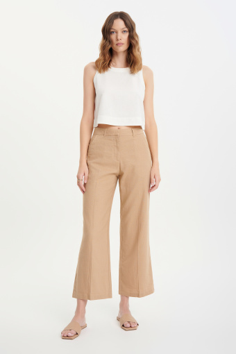 Luźne beżowe spodnie