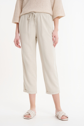 Luźne kremowe spodnie 7/8