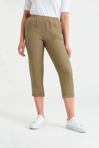 Oliwkowe spodnie 7/8 z gumką w talii