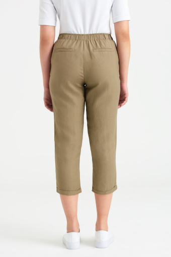 Oliwkowe spodnie 7/8 z gumką w talii
