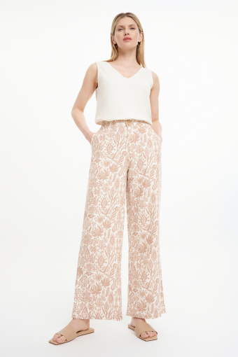 Spodnie wide leg z printem kremowe