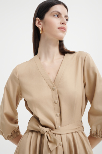 Elegancka rozkloszowana sukienka z paskem w talii 