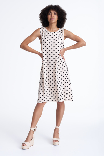 Prosta, kremowa sukienka w groszki
