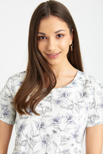 Lniana sukienka z subtelnym nadrukiem w kwiaty