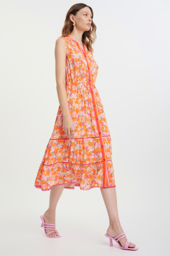 Rozkloszowana sukienka w kwiaty z kontrastową lamówką Rozkloszowana sukienka w kwiaty z kontrastową lamówką