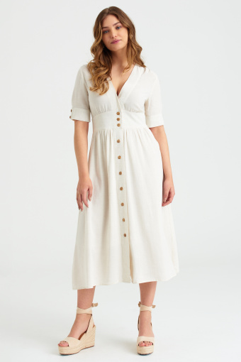 Kremowa sukienka midi z podkreśloną talią
