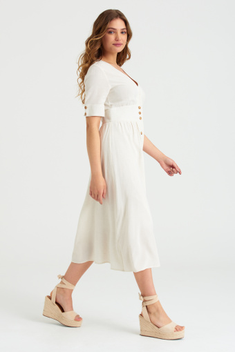 Kremowa sukienka midi z podkreśloną talią
