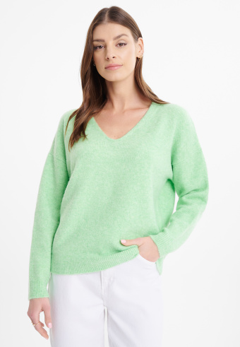 Jasnozielony sweter oversize