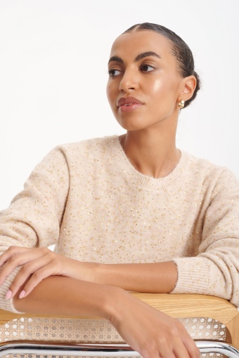 Beżowy sweter z cekinową aplikacją