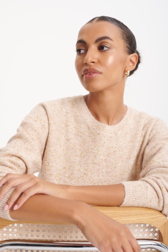 Beżowy sweter z cekinową aplikacją