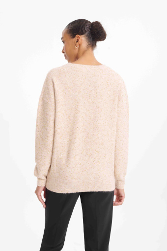 Beżowy sweter z cekinową aplikacją