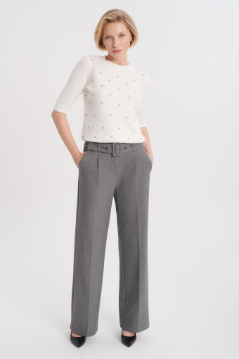 Kremowy sweter z błyszczącą aplikacją z cyrkonii