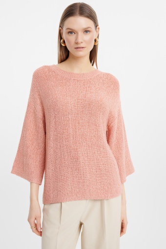 Brzoskwiniowy sweter z szerokimi rękawami