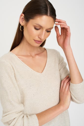 Kremowy sweter z drobnymi cekinami