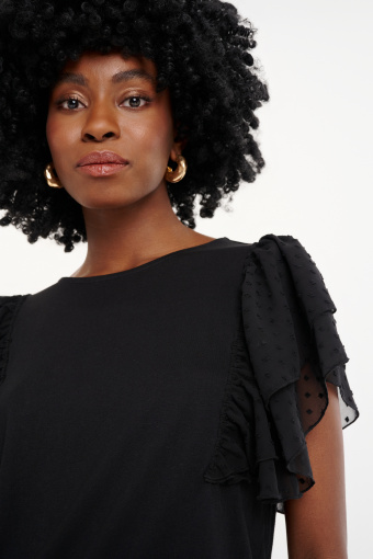 Elegancki czarny top z ozdobnymi rękawami Elegancki czarny top z ozdobnymi rękawami