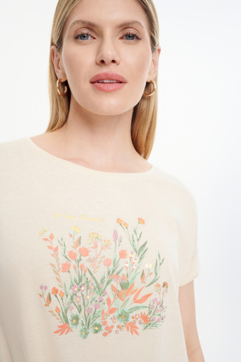 Beżowy top z roślinną grafiką