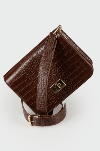 Torebka prostokątna w wężową strukturę z ozdobnym zapięciem