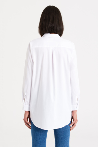 Biała tunika z koszulowym kołnierzykiem
