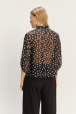 Efektowna czarna bluzka w kropki z rękawami do łokcia
