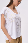 Biały top z grafiką z motywem roślinnym