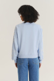 Bluza z kwiatami na rękawach kolor baby blue