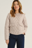 Lekka beżowa kurtka z subtelnym pikowaniem