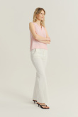 Kremowe eleganckie spodnie z rozszerzaną nogawką