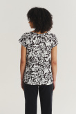 Kremowy top z nadrukiem w czarne kwiaty