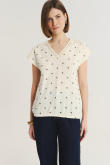 Biały top z nadrukiem w groszki