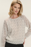 Biała bluzka z zapięciem typu łezka nadruk w kropki