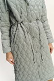 Pikowana jasnozielona kurtka z kapturem