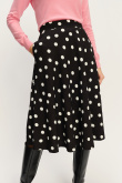 Kobieca delikatnie rozkloszowana spódnica midi nadruk w groszki